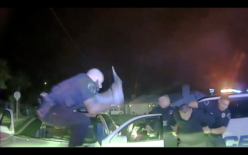 Then-Officer Jeffrey Aguirre jumped over the hood of Jose Lenor Garcia's car while he was being arrested on Nov. 21, 2020 and struck him with a baton about five times.