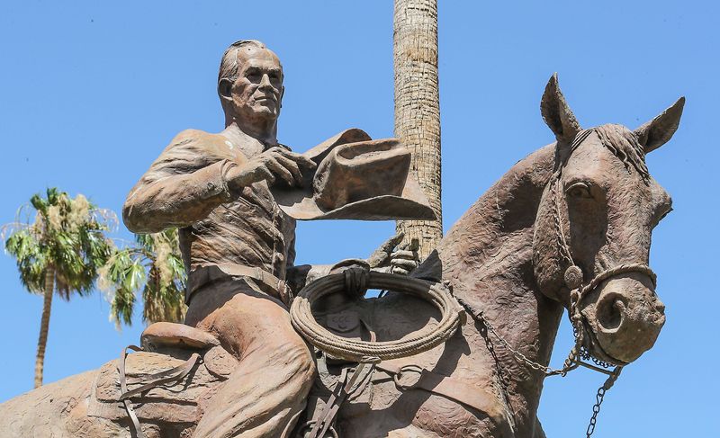 A statue of longtime Palm Springs mayor Frank Bogert sits in front of Palm Springs City Hall, June 18, 2020.