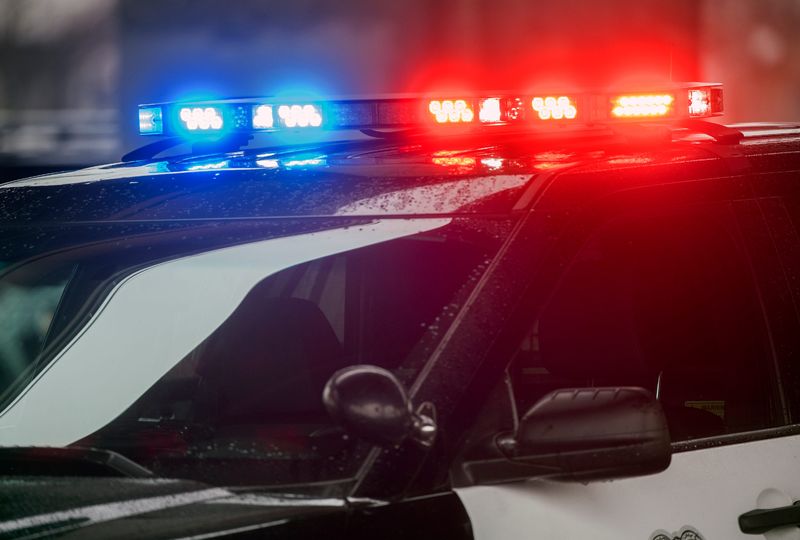 Lights on a Stockton police vehicle flash in downtown Stockton.
