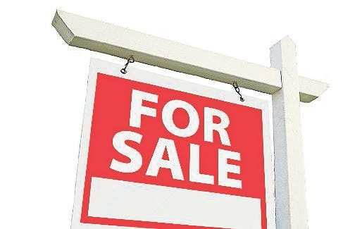 Sold Home For Sale Sign in Front of New House