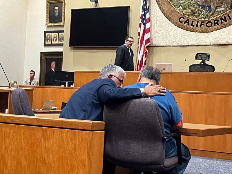 Attorney Ron Bamieh, left, speaks to his client Loay Alnaji, 50, of Moorpark in a Ventura courtroom on Nov. 17, 2023. Alnaji has pleaded guilty May 5 to involuntary manslaughter and battery with serious bodily injury for the death of a Jewish protester, Paul Kessler, 69.