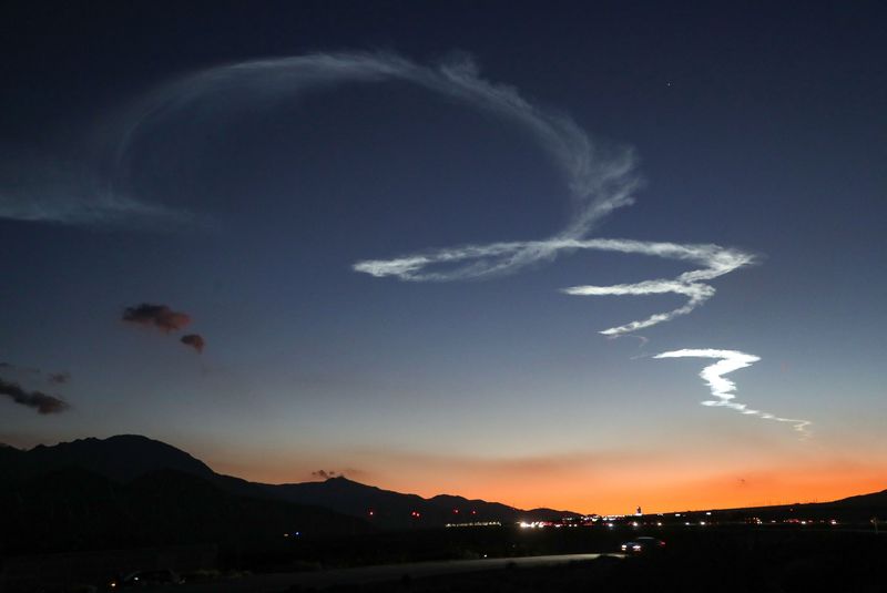 The contrails from the SpaceX Falcon 9 rocket launch were visible in the sky over Southern California as seen from Whitewater, Calif., April 1, 2024.