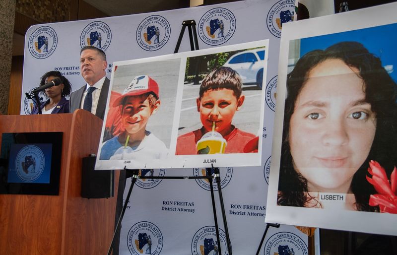 San Joaquin County district attorney Ron Freitas, right, holds a news conference with U.S. Marshall Lasha R. Boyden at the DA’s office in downtown Stockton on Jul. 12, 2024 about the the arrest of Jose Cardona who is accused of the arson and murder of Lizbeth Josefina Gutiérrez and her 7 and 10 year old sons as they slept, in a fire that destroyed the 5th wheel trailer that they lived in Stockton.