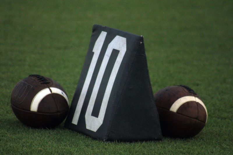 Two footballs rest near the 10-yard line during a high school preseason football game between Fletcher and Creekside in Jacksonville Beach, Florida, on August 19, 2022. [Clayton Freeman/Florida Times-Union]

081922 Creeksidefletcher25 Stock