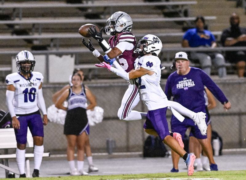 Mt. Whitney's Adrian Huerta takes a pass away from from Mission Oak's Michael Quinones in non-league high school football on Friday, September 13, 2024.