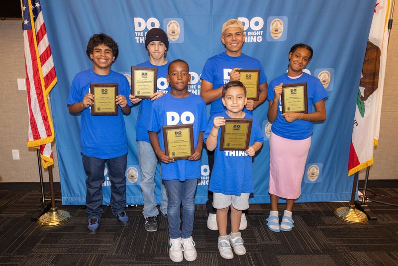Jayden Lara, Aiden Henley-Embrey, Damian Gutierrez, Ti'anah Castro (back row), Oddis Lewis and Mateo Gastelum-Herrera were honored Aug. 21, 2024, for doing the right thing.