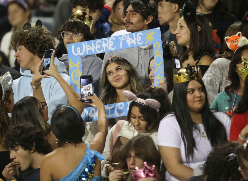 The La Quinta High School student section entertains themselves as the football team hosted Rancho MIrage in La Quinta, Calif., Oct. 18, 2024.