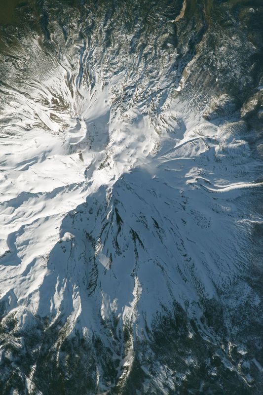 This zoomed in image of Mt. Shasta was taken by Astronauts aboard the International Space Station while flying over California on April 1, 2018.