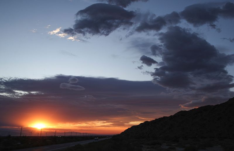 As the sun rises to the east, strange cloud formations roll in from the west tumbling over Mt. San Jacinto and bringing cooler temperatures to the Coachella Valley this week as seen from Palm Springs, Calif., Oct. 28, 2024.