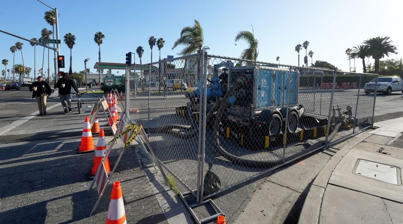 The city of Ventura monitors the sewer line under Monmouth Way and Harbor Boulevard at the Sinclair gas station on Tuesday, Oct. 29, 2024, after a fuel leak in September was traced to the station.