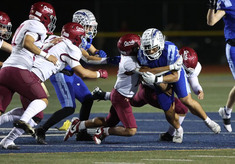 Fillmore's Raymond Curiel is taken down by Santa Paula's Imari Brown during the teams' rivalry game in 2024. The schools have one of the most historic prep football rivalries in the country.