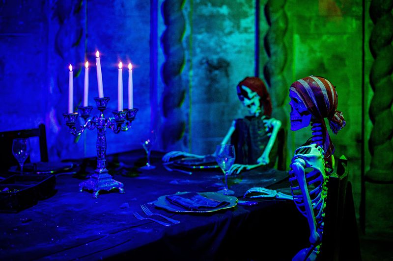 A table set for ex-pirates at the end of the catacomb's corridor.