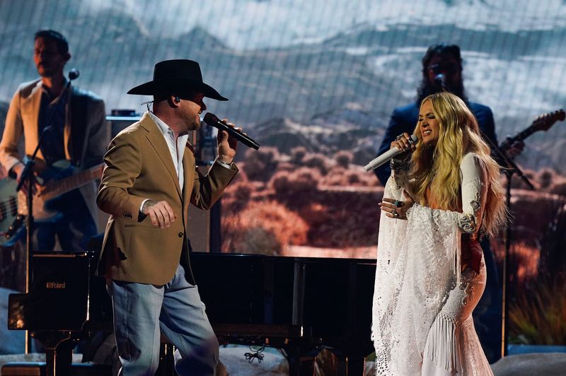 Cody Johnson and Carrie Underwood perform onstage during the 58th Annual Country Music Association Awards in Nashville, Tenn., Wednesday, Nov. 20, 2024.