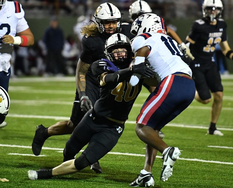 Amarillo's Troy Brown (40) takes down Richland's Jayshon Gibson (10) during an Area playoff game on Saturday, November 23, 2024 at Memorial Stadium.