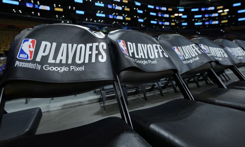 May 8, 2023; Los Angeles, California, USA; The NBA Playoffs presented by Google Pixel logo on the seat cushions of the Los Angeles Lakers bench during game four of the 2023 NBA playoffs at Crypto.com Arena. Mandatory Credit: Kirby Lee-USA TODAY Sports