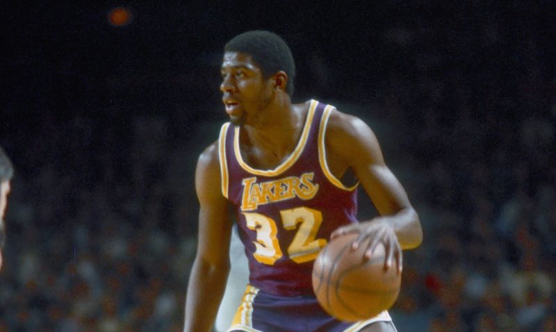 Mar 1980; Unknown Location; FILE PHOTO; Los Angeles Lakers guard (32) Ervin "Magic" Johnson in action during the 1980-81 season. Mandatory Credit: Photo By Malcolm Emmons-USA TODAY Sports copyright (c) Malcolm Emmons