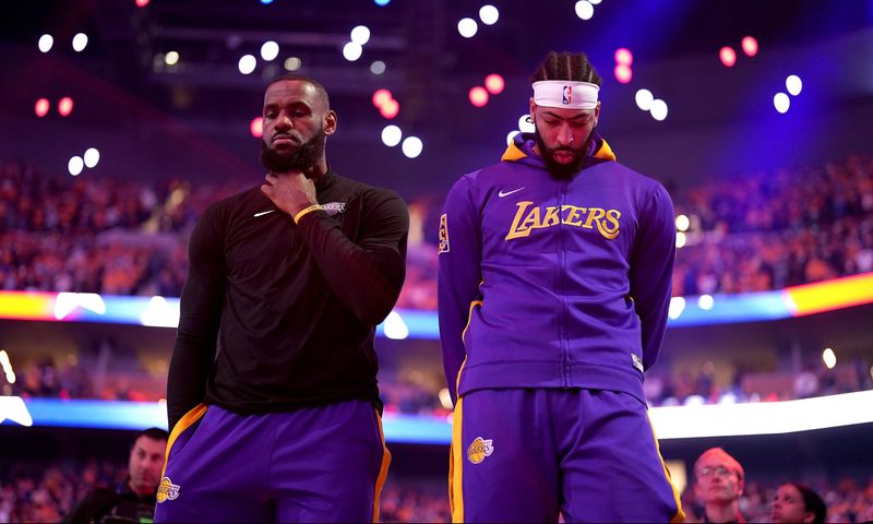 May 2, 2023; San Francisco, California, USA; Los Angeles Lakers forward LeBron James (6) stands next to forward Anthony Davis (3) during the playing of the national anthem before game one of the 2023 NBA playoffs against the Golden State Warriors at the Chase Center. Mandatory Credit: Cary Edmondson-USA TODAY Sports