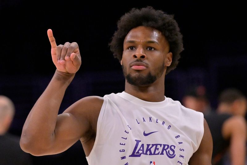 Dec 8, 2024; Los Angeles, California, USA; Los Angeles Lakers guard Bronny James (9) warms up prior to the game against the Portland Trail Blazers at Crypto.com Arena. Mandatory Credit: Jayne Kamin-Oncea-Imagn Images