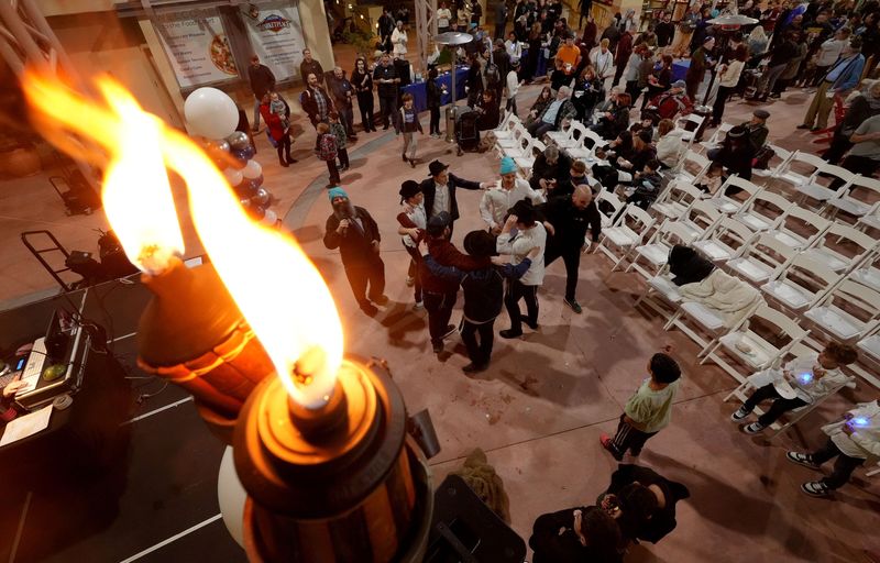Chabad of Thousand Oaks celebrates the 24th menorah lighting at the Janss Marketplace during its annual Hanukkah Family Festival on Thursday, Dec. 26, 2024. The evening featured a giant menorah, treats and entertainment such as the Thousand Oaks Jewish Children's Choir.