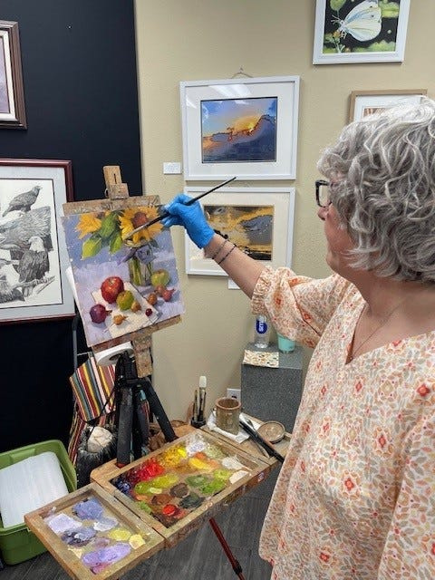 Karen Werner demonstrates her oil painting technique for the Artists of the High Desert.