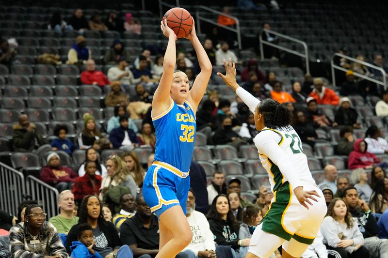 Jan 20, 2025; Newark, New Jersey, USA; UCLA Bruins forward Angela Dugalic (32) looks to pass against Baylor Lady Bears guard Bella Fontleroy (22) during the second half at Prudential Center. Mandatory Credit: Chris Jones-Imagn Images