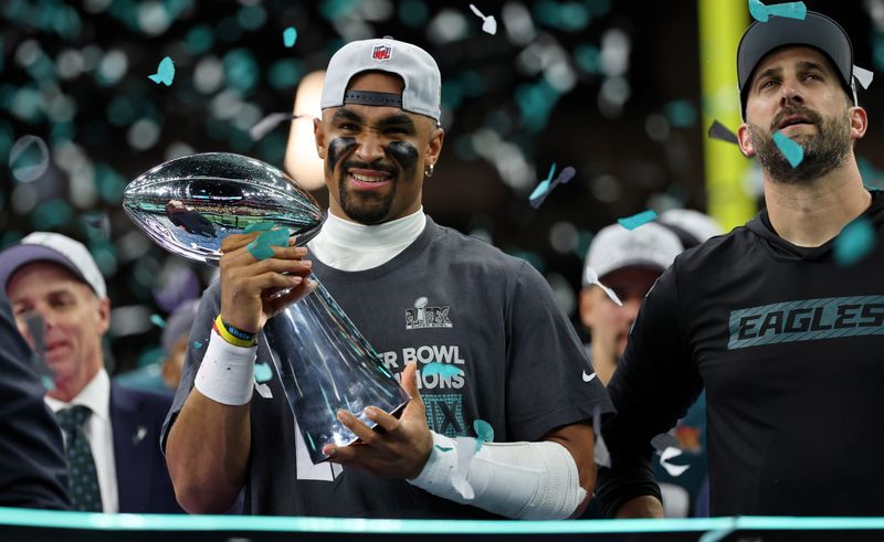 Feb 9, 2025; New Orleans, LA, USA; Philadelphia Eagles quarterback Jalen Hurts (1) celebrates with head coach Nick Sirianni after winning against Kansas City Chiefs in Super Bowl LIX at Caesars Superdome. Mandatory Credit: Geoff Burke-Imagn Images