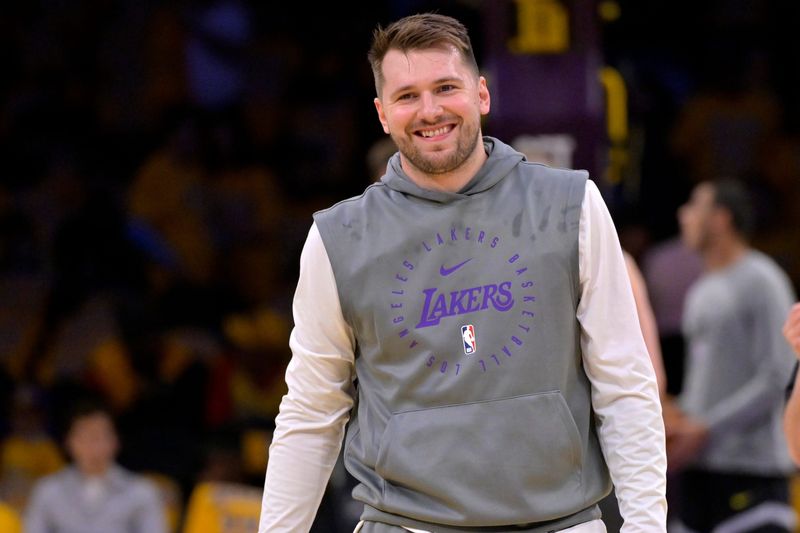 Feb 10, 2025; Los Angeles, California, USA; Los Angeles Lakers guard Luka Doncic (77) warms up prior to the game against the Utah Jazz at Crypto.com Arena. Mandatory Credit: Jayne Kamin-Oncea-Imagn Images