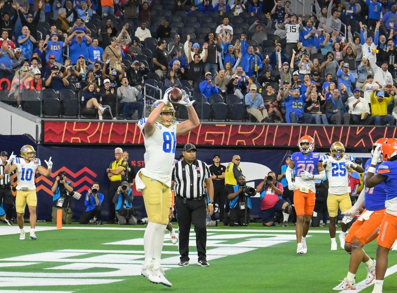 Dec 16, 2023; Inglewood, CA, USA; UCLA Bruins tight end Hudson Habermehl (81) catches a short pass fort a touchdown against the Boise State Broncos in the first quarter during the Starco Brands LA Bowl at SoFi Stadium. Mandatory Credit: Robert Hanashiro-USA TODAY Sports