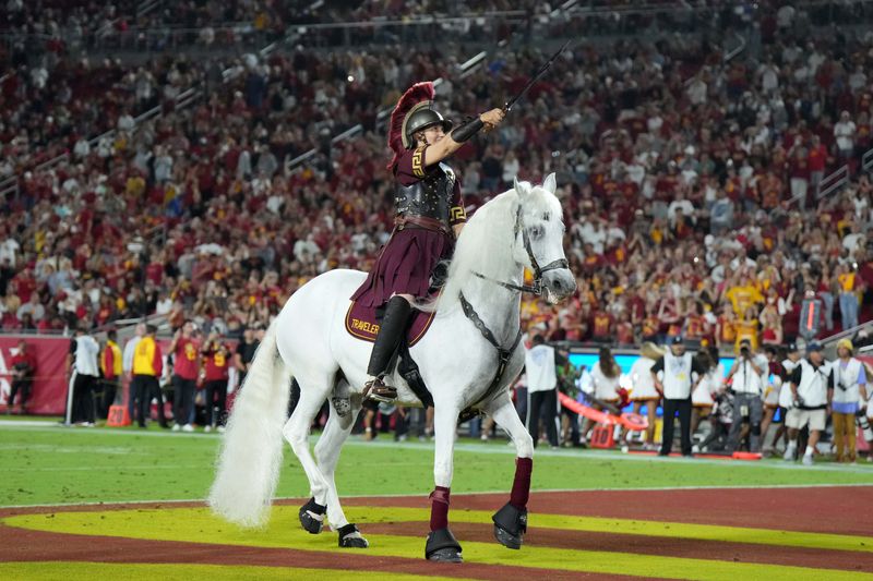 Sep 17, 2022; Los Angeles, California, USA; Southern California Trojans white horse mascot Traveler performs in the second half against the Fresno State Bulldogs at United Airlines Field at Los Angeles Memorial Coliseum. Mandatory Credit: Kirby Lee-USA TODAY Sports
