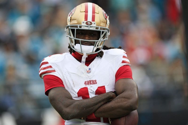 San Francisco 49ers wide receiver Brandon Aiyuk (11) reacts to his touchdown score during the first quarter of an NFL football game Sunday, Nov. 12, 2023 at EverBank Stadium in Jacksonville, Fla. The San Francisco 49ers defeated the Jacksonville Jaguars 34-3. [Corey Perrine/Florida Times-Union]