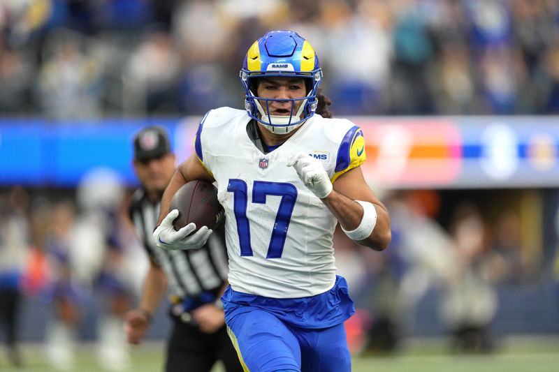 Dec 3, 2023; Inglewood, California, USA;Los Angeles Rams wide receiver Puka Nacua (17) scores on a 70-yard touchdown reception against the Cleveland Browns in the first half at SoFi Stadium. Mandatory Credit: Kirby Lee-USA TODAY Sports