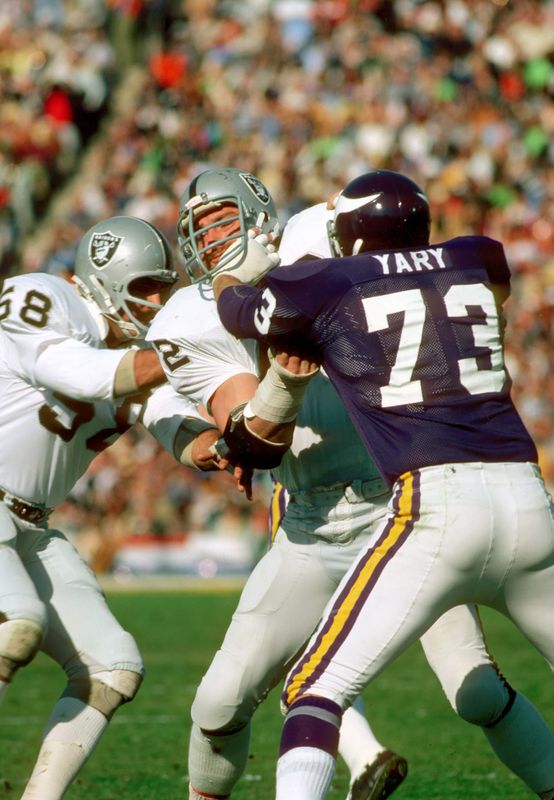 Jan 9, 1977; Pasadena, CA; USA; FILE PHOTO; Oakland Raiders defensive end John Matuszak (72) fights off a block from Minnesota Vikings tackle Ron Yary (73) during Super Bowl XI at the Rose Bowl. The Raiders defeated the Vikings 32-14. Mandatory Credit: Tony Tomsic-USA TODAY Sports