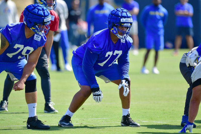 Jun 8, 2022; Los Angeles, CA, USA; Los Angeles Rams tackle Alaric Jackson (77) during mini camp at Cal Lutheran University. Mandatory Credit: Gary A. Vasquez-USA TODAY Sports