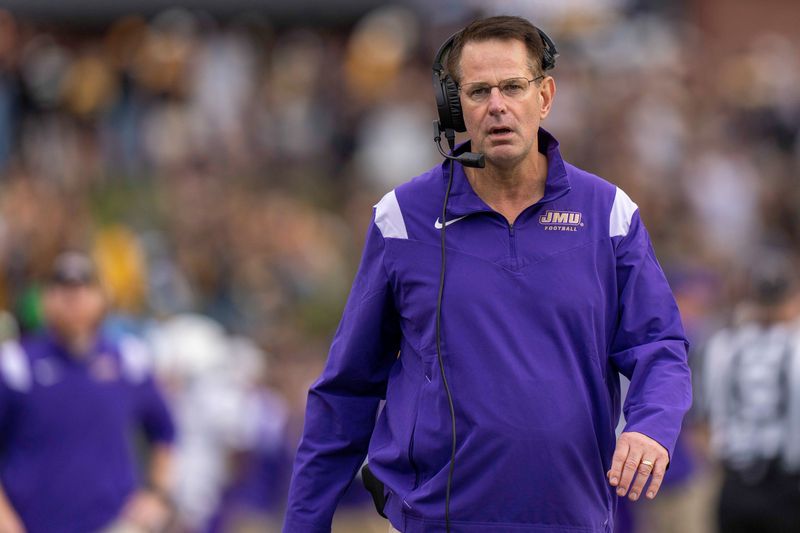 Sep 24, 2022; Boone, North Carolina, USA; James Madison Dukes head coach Curt Cignetti walks the sideline during a game against the Appalachian State Mountaineers at Kidd Brewer Stadium. Mandatory Credit: David Yeazell-USA TODAY Sports