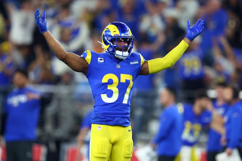 Jan 13, 2025; Glendale, AZ, USA; Los Angeles Rams safety Quentin Lake (37) reacts during the second half against the Minnesota Vikings in an NFC wild card game at State Farm Stadium. Mandatory Credit: Mark J. Rebilas-Imagn Images