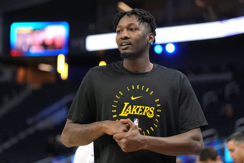 Jan 25, 2025; San Francisco, California, USA; Los Angeles Lakers forward Dorian Finney-Smith (17) before the game against the Golden State Warriors at Chase Center. Mandatory Credit: Darren Yamashita-Imagn Images