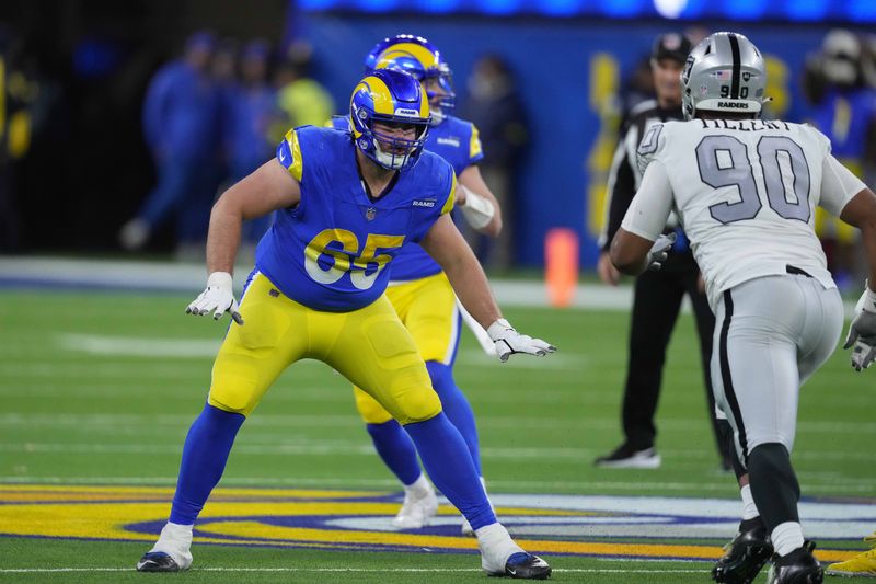 Dec 8, 2022; Inglewood, California, USA; Los Angeles Rams center Coleman Shelton (65) blocks against Las Vegas Raiders defensive tackle Jerry Tillery (90) at SoFi Stadium. Mandatory Credit: Kirby Lee-USA TODAY Sports