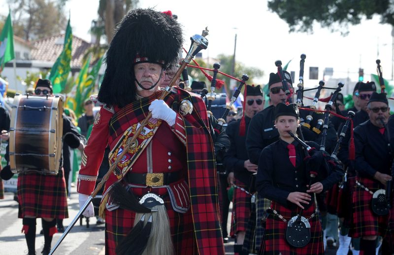 Craig Stevens, of Camarillo, leads the Gold Coast Pipe Band and Pipes and Drums in the County Ventura St. Patrick's Day Parade in downtown Ventura on March 15, 2025.