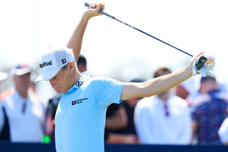Will Zalatoris stretches before teeing off on the first hole during the third round of The Players Championship PGA golf tournment Saturday, March 15, 2025 at TPC Sawgrass in Ponte Vedra Beach, Fla. [Corey Perrine/Florida Times-Union]