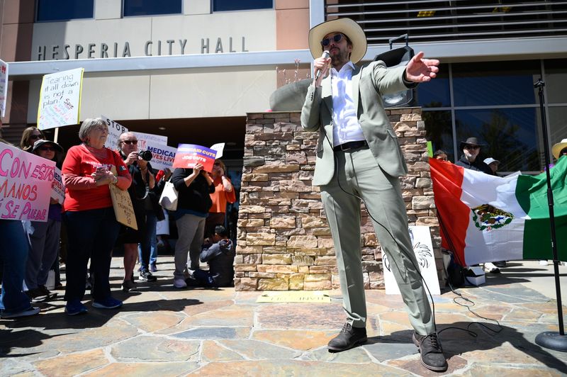 Former Democratic U.S. House of Representatives District 23 candidate Derek Marshall speaks during the People’s Townhall Protest at Hesperia City Hall on Saturday, April 5th, 2025 in Hesperia. The protests were against federal budget cuts by the Trump administration and DOGE.