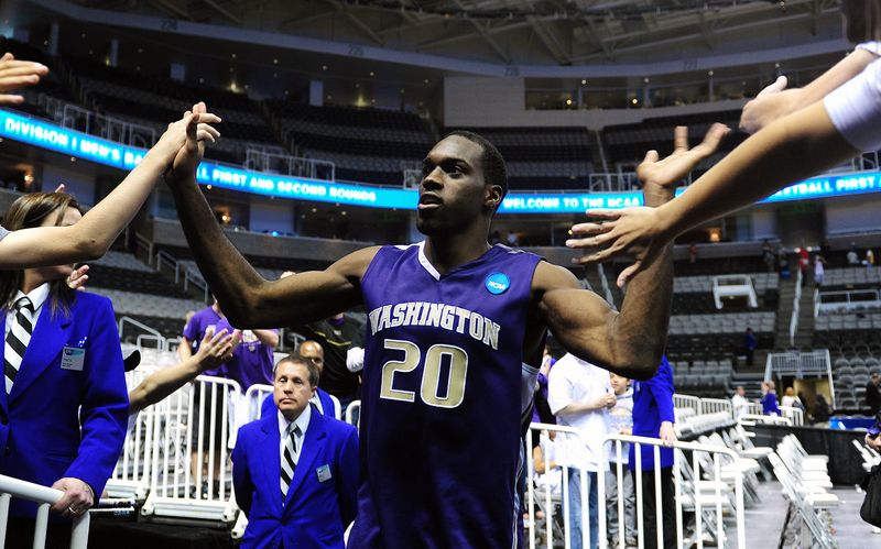 March 20, 2010; San Jose, CA, USA; Washington Huskies forward Quincy Pondexter (20) celebrates walking off the court after the game against the New Mexico Lobos in the second round of the 2010 NCAA mens basketball tournament at HP Pavilion. Washington defeated New Mexico 82-64. Mandatory Credit: Kyle Terada-USA TODAY Sports