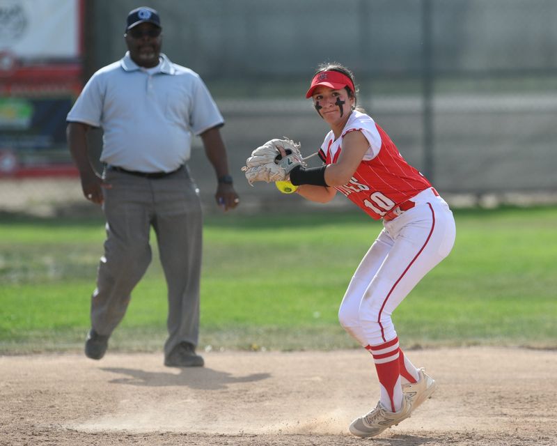 Oak Hills’ Kayla Cazarez throws the ball to first during the sixth inning on Thursday, April 10th, 2025 in Hesperia. Oak Hills defeated Serrano 6-1.