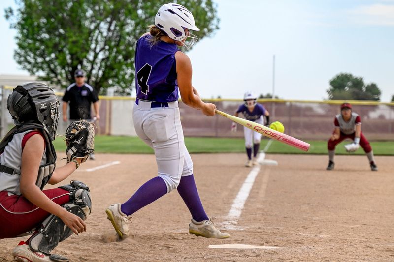 Mission Oak's Jadyn Albright bats against Tulare Union in West Yosemite League high school softball Friday, April 11, 2025. She would eventually hit a double and drive home Mission Oak's Braelyn Serpa from 3rd.
