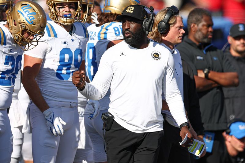 Oct 19, 2024; Piscataway, New Jersey, USA; UCLA Bruins head coach DeShaun Foster during the second half against the Rutgers Scarlet Knights at SHI Stadium. Mandatory Credit: Vincent Carchietta-Imagn Images