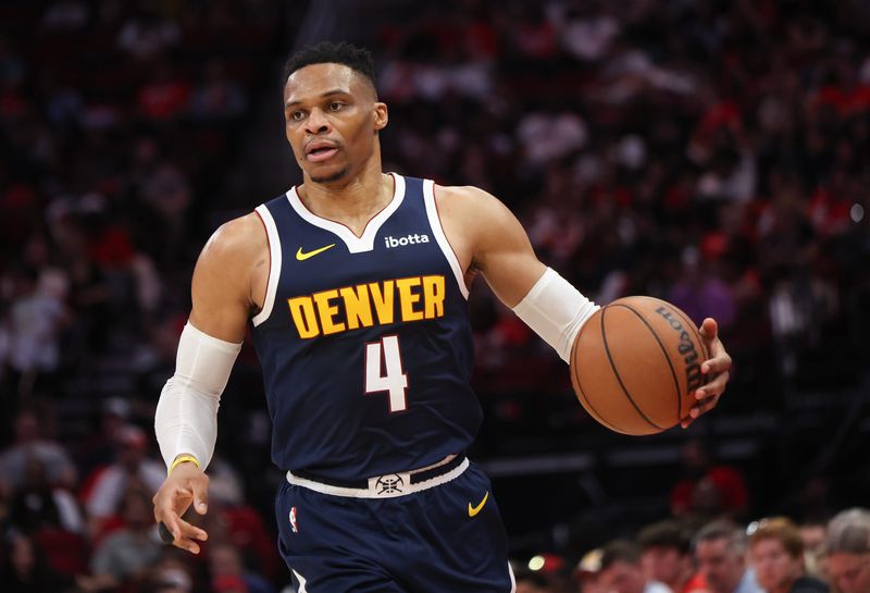 Apr 13, 2025; Houston, Texas, USA; Denver Nuggets guard Russell Westbrook (4) dribbles against the Houston Rockets in the second half at Toyota Center. Mandatory Credit: Thomas Shea-Imagn Images