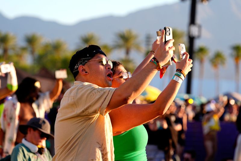 Festivalgoers sing along with Natasha Bedingfield as she joined Gustavo Dudamel and the Los Angeles Philharmonic to perform at the Outdoor Theatre during the Coachella Valley Music and Arts Festival in Indio, Calif., on Saturday, April 19, 2025.