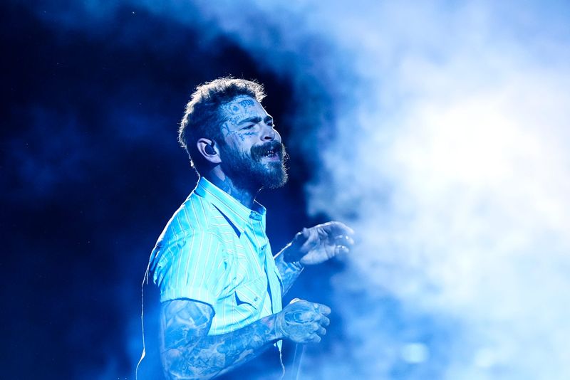 Post Malone performs his headliner set on the Coachella Stage at the Coachella Valley Music and Arts Festival in Indio, Calif., on Sunday, April 20, 2025.