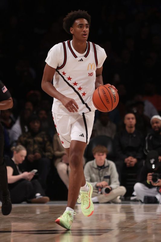 Apr 1, 2025; Brooklyn, NY, USA; McDonald's All American West guard Alijah Arenas (16) dribbles the ball during the first half of the game McDonald's All American East at Barclays Center. Mandatory Credit: Pamela Smith-Imagn Images