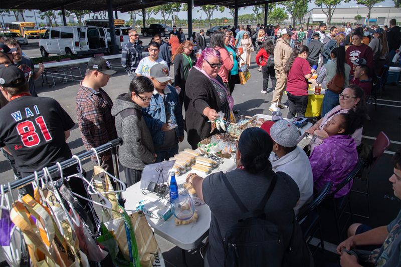 People attend the San Joaquin County Office of Education’s Workability I farmers market program through the San Joaquin County Special Education Local Plan Area (SELPA), part of the SJCOE on Apr. 24, 2025. Workability I is a state program that provides students ages 12 to 22 vocational services and places students 16 and older in paid positions with local employers.