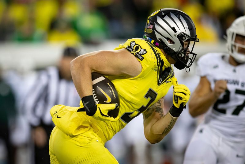 Oregon Ducks tight end Terrance Ferguson picks up yards as the Ducks host the Spartans Friday, Oct. 4, 2024 at Autzen Stadium in Eugene, Ore.